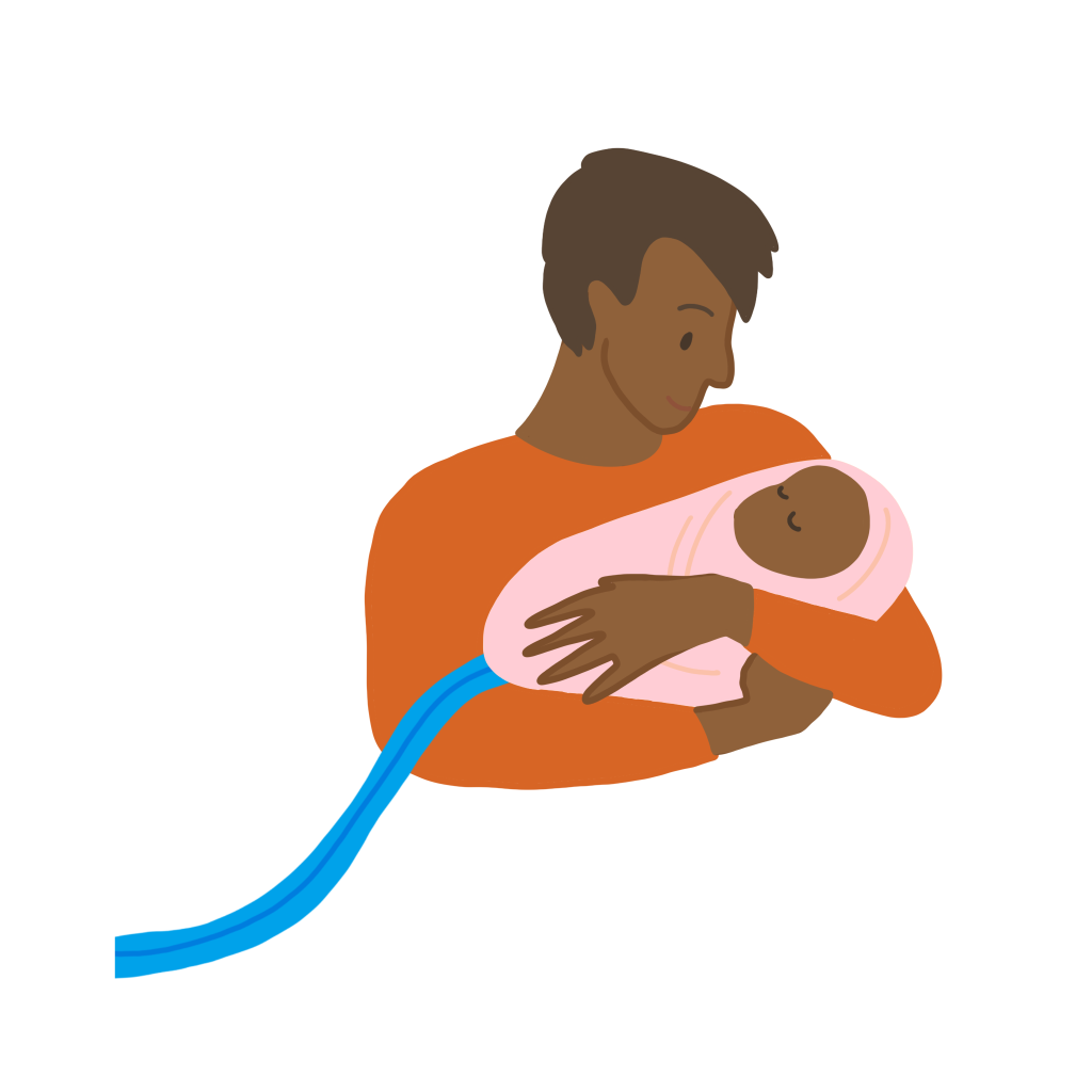 Male Holds Baby after loss using CuddleCot