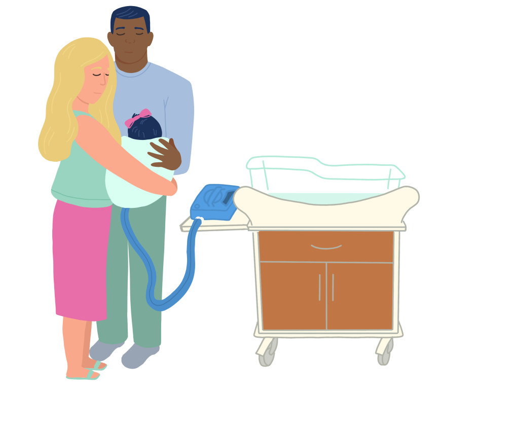 Family Holds Baby after loss using CuddleCot
